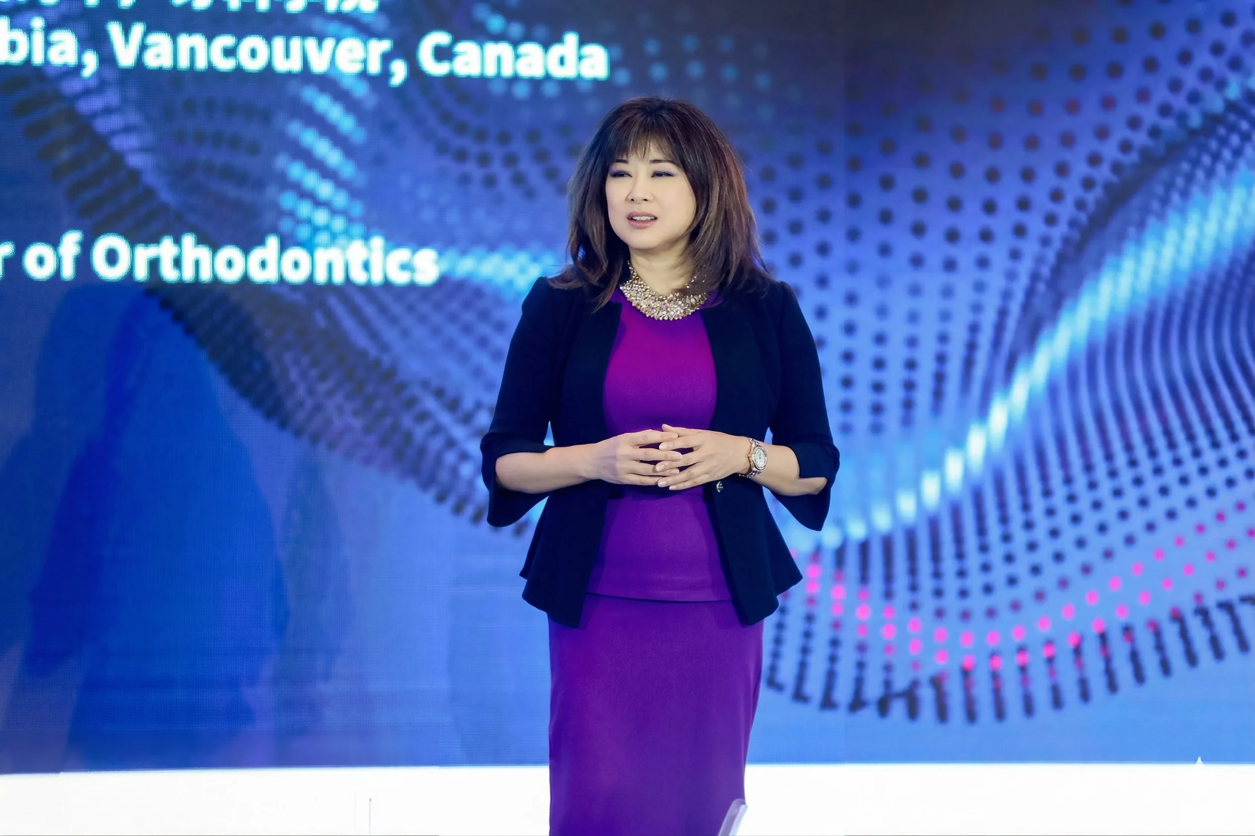 Dr. Sandra Khong Tai presenting on clear aligner orthodontics