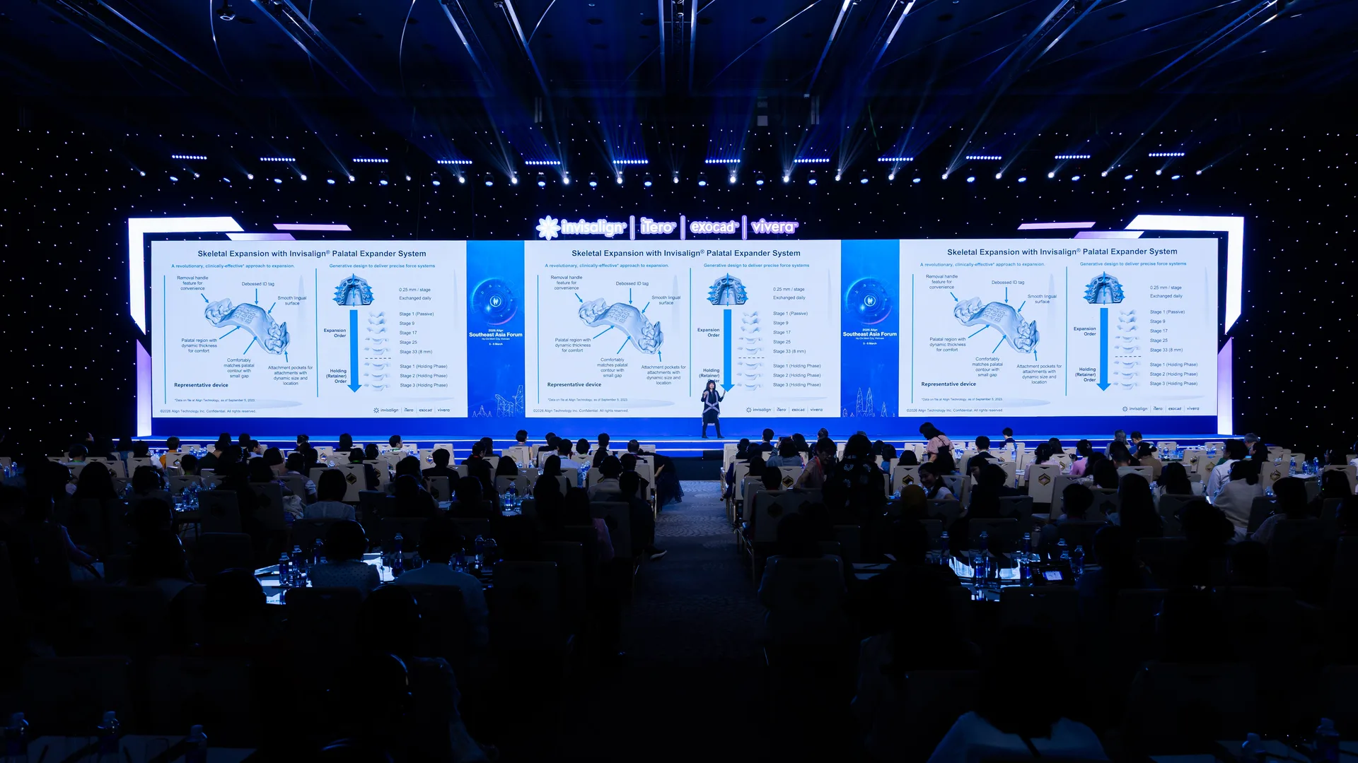 Dr. Sandra Khong Tai speaking on stage